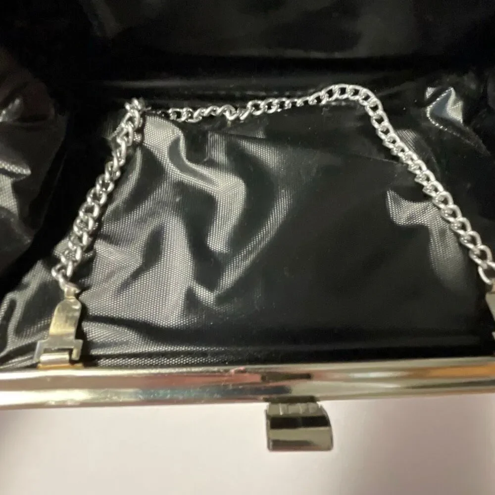 Vintage silver clutch with chain handle. Silver metallic